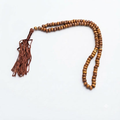 99-bead barrel-shaped natural wood tasbih with gold spacers and brown tassel